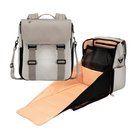 Willow diaper bag backpack in mushroom with fold-out changing station open